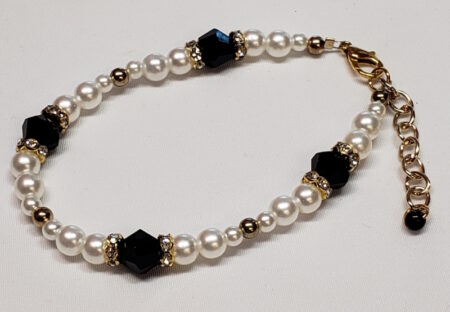 Single band four large black with pearls